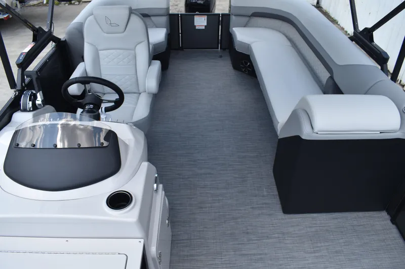 Slide: The Image of 2026 Lowe SF 212 WT Sport Fish boat interior with modern seating and steering console. - 28