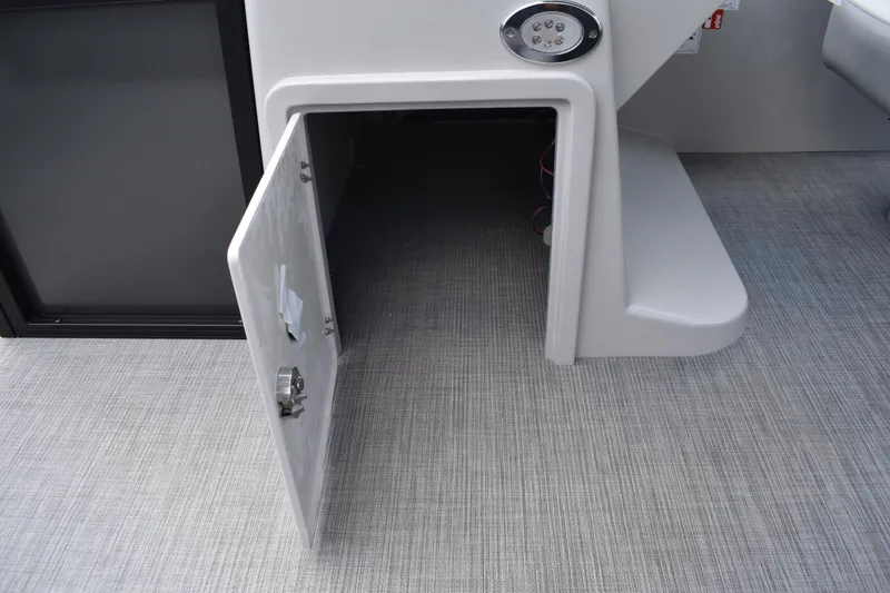 Slide: The Image of Open storage compartment on 2026 Lowe SF 212 WT Sport Fish boat. - 31