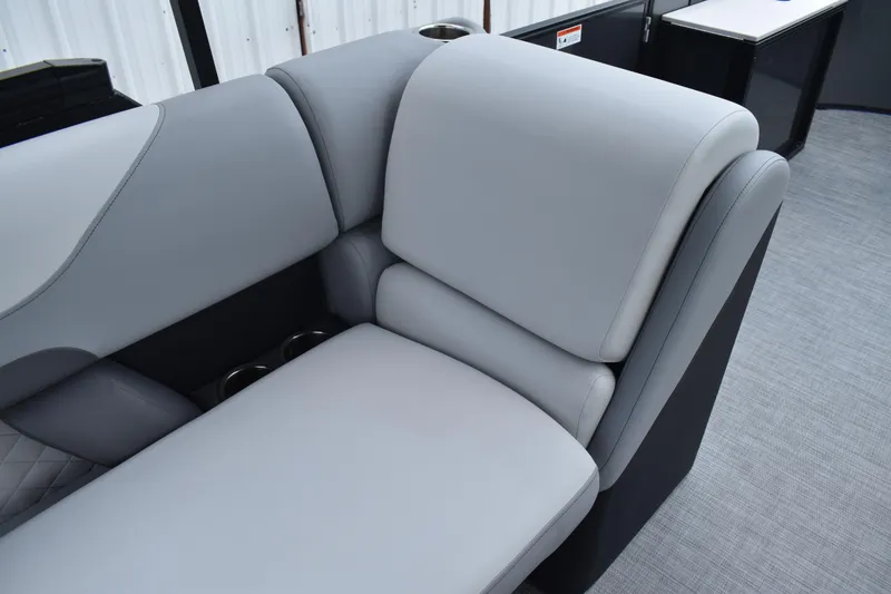 Slide: The Image of 2026 Lowe SF 212 WT Sport Fish boat with luxurious gray seating and cup holders. - 44