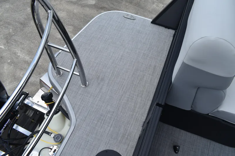Slide: The Image of 2026 Lowe SF 212 WT Sport Fish boat deck with seating and railing. - 52