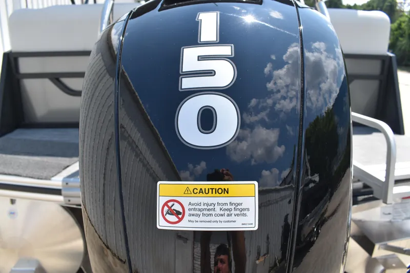 Slide: The Image of Outboard motor with "150" label on a 2026 Lowe SF 212 WT Sport Fish boat. - 8