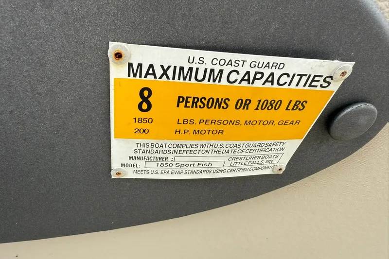 Slide: The Image of 2014 Crestliner 1850 Sportfish capacity label, 8 persons or 1080 lbs, 200 HP motor. - 14
