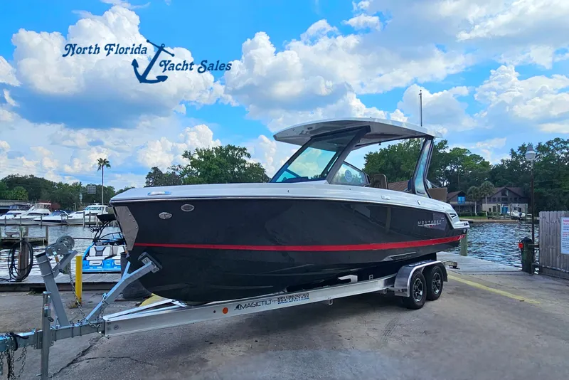 The Image of 2026 Monterey Elite 25 OB boat on trailer at North Florida Yacht Sales. - 0
