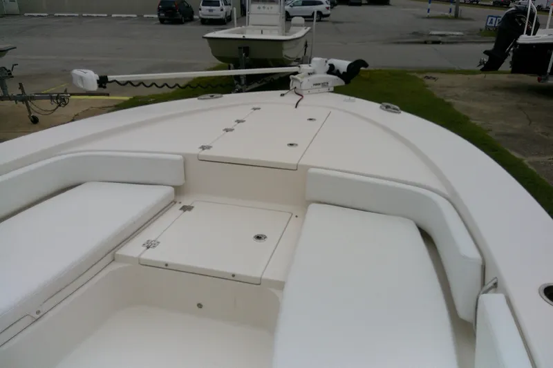 Slide: The Image of 2021 Robalo 246 Cayman boat deck with seating and storage compartments. - 11