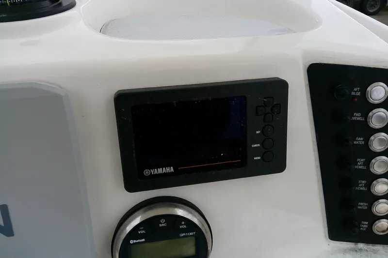 Slide: The Image of Control panel of 2021 Robalo 246 Cayman with Yamaha display and buttons. - 29