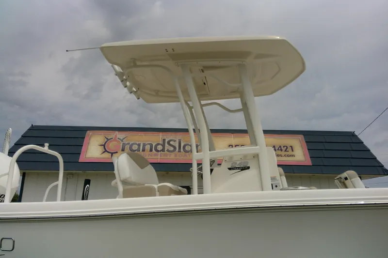 Slide: The Image of 2021 Robalo 246 Cayman boat with T-top, displayed at Grand Slam sign. - 39