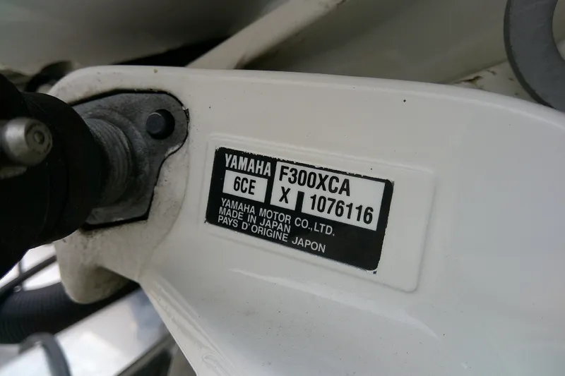Slide: The Image of Yamaha F300XCA engine label on 2021 Robalo 246 Cayman boat, made in Japan. - 7