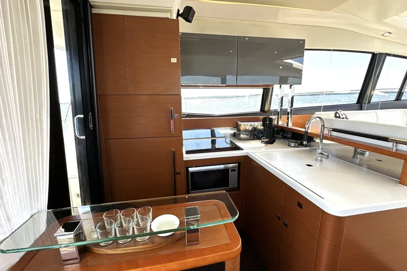 Slide: The Image of Luxurious kitchen interior of 2016 Prestige 500 S yacht with modern amenities. - 14