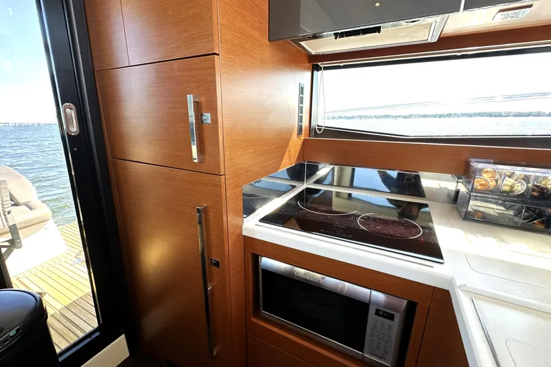 Slide: The Image of Modern kitchen interior on 2016 Prestige 500 S yacht with ocean view. - 17
