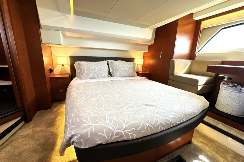 Slide: The Image of Luxurious bedroom interior of 2016 Prestige 500 S yacht with elegant bedding and modern design. - 41