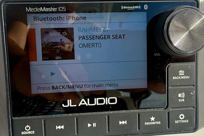 Slide: The Image of JL Audio MediaMaster 105 displaying song "Passenger Seat" via Bluetooth on Tidewater 320 CC Adventure. - 29