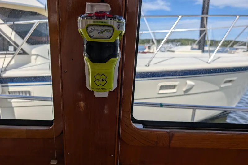 Slide: The Image of ACR device on 2006 Grand Banks 49 Eastbay SX yacht, docked with view of another boat. - 44