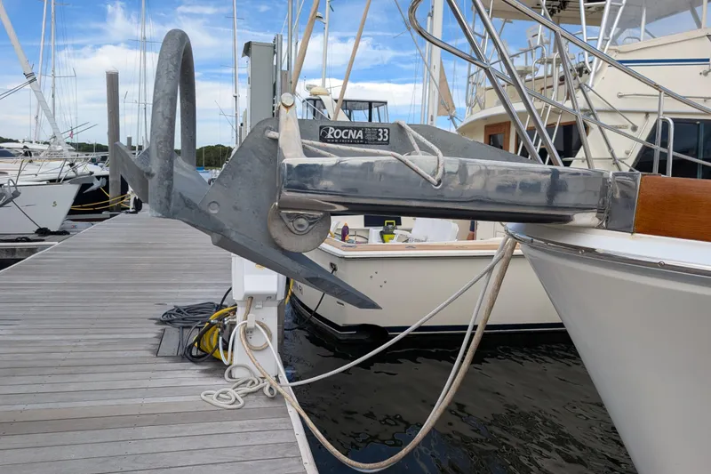 Slide: The Image of 2006 Grand Banks 49 Eastbay SX yacht with Rocna 33 anchor at marina dock. - 68