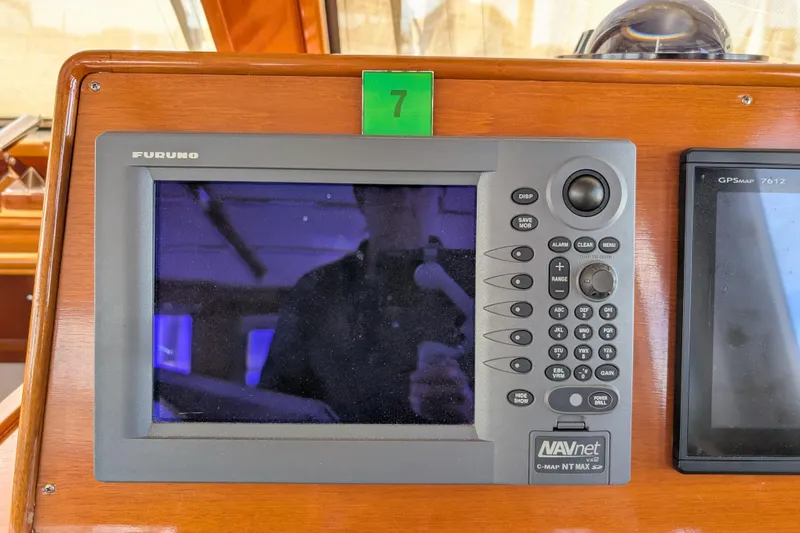 Slide: The Image of Furuno NAVnet VX2 marine display on 2006 Grand Banks 49 Eastbay SX yacht dashboard. - 30