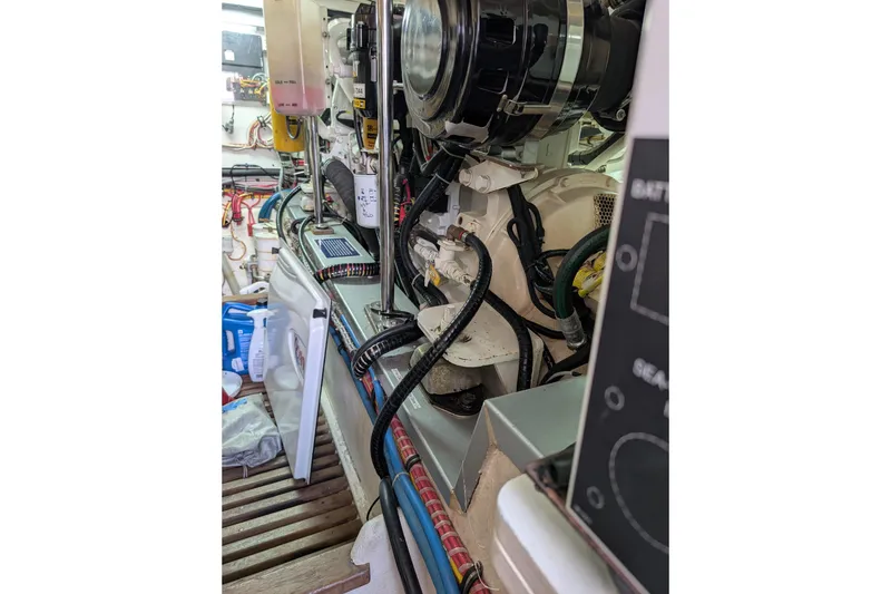 Slide: The Image of Engine room of 2006 Grand Banks 49 Eastbay SX with visible wiring and components. - 66