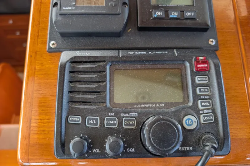 Slide: The Image of VHF marine radio on 2006 Grand Banks 49 Eastbay SX yacht dashboard. - 36