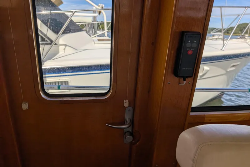 Slide: The Image of Interior view of 2006 Grand Banks 49 Eastbay SX yacht door and window. - 43