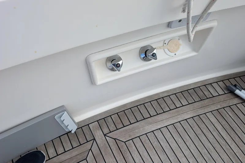 Slide: The Image of Control panel on 2006 Grand Banks 49 Eastbay SX yacht with teak deck flooring. - 20