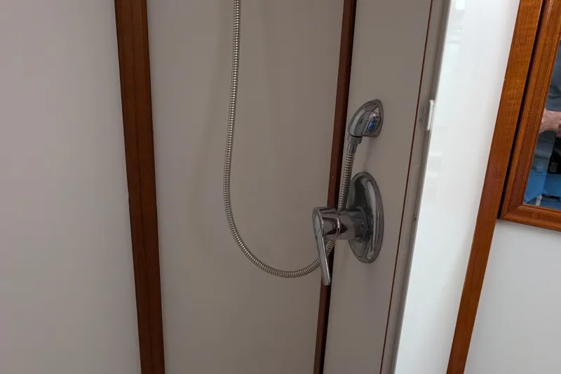 Slide: The Image of Shower fixture inside 2006 Grand Banks 49 Eastbay SX yacht bathroom. - 60