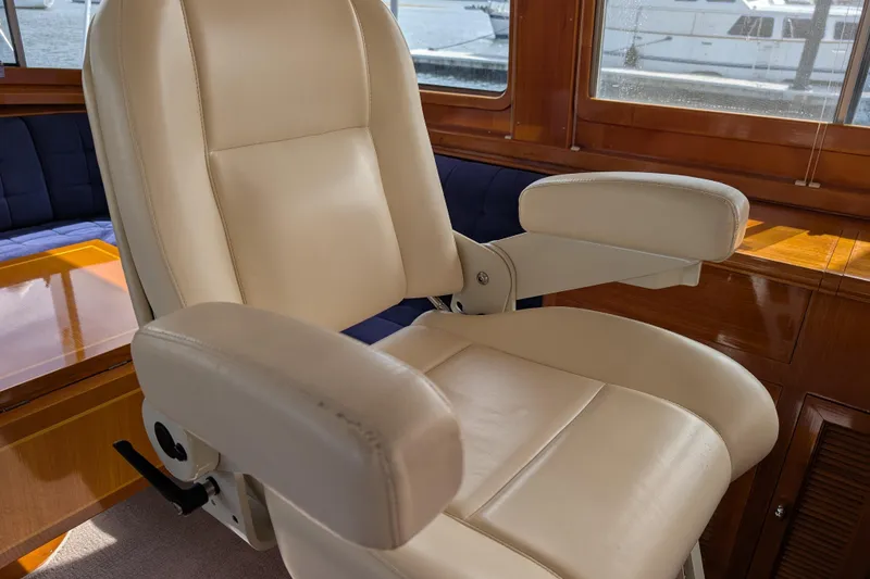Slide: The Image of Luxurious leather captain's chair on 2006 Grand Banks 49 Eastbay SX yacht interior. - 39
