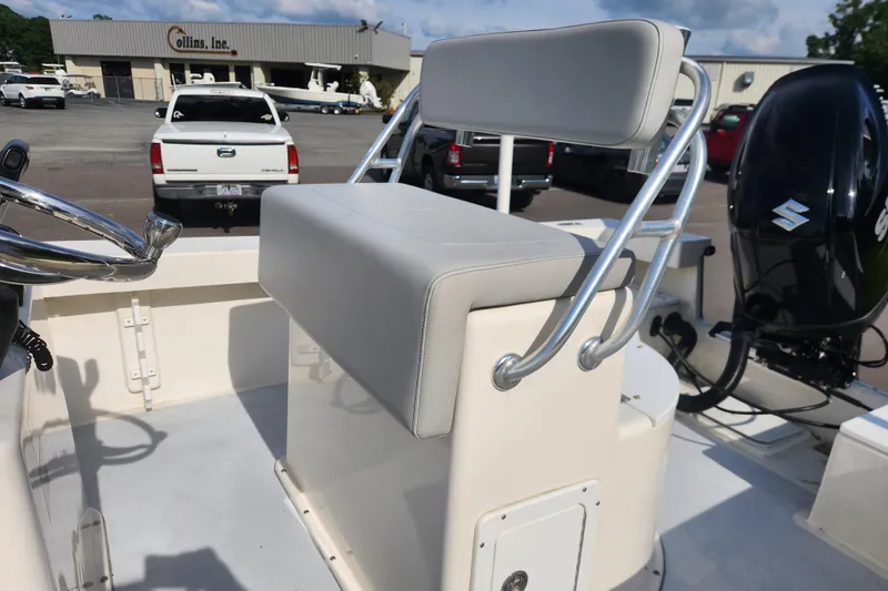 Slide: The Image of 2023 May-Craft 20 Cape Classic boat interior with seating and Suzuki outboard motor. - 13