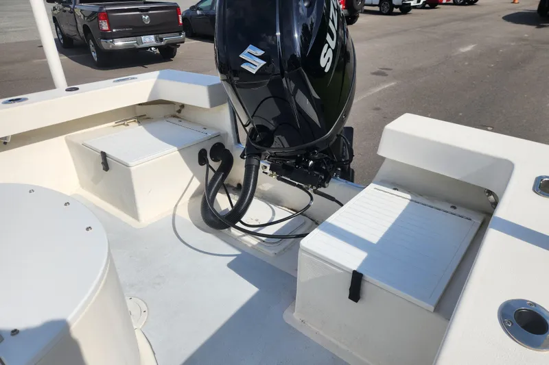 Slide: The Image of 2023 May-Craft 20 Cape Classic boat with Suzuki outboard motor, rear seating, and storage compartments. - 15
