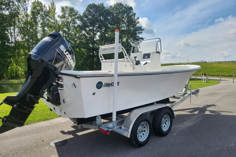 Slide: The Image of 2023 May-Craft 20 Cape Classic boat on trailer with Suzuki outboard motor. - 2