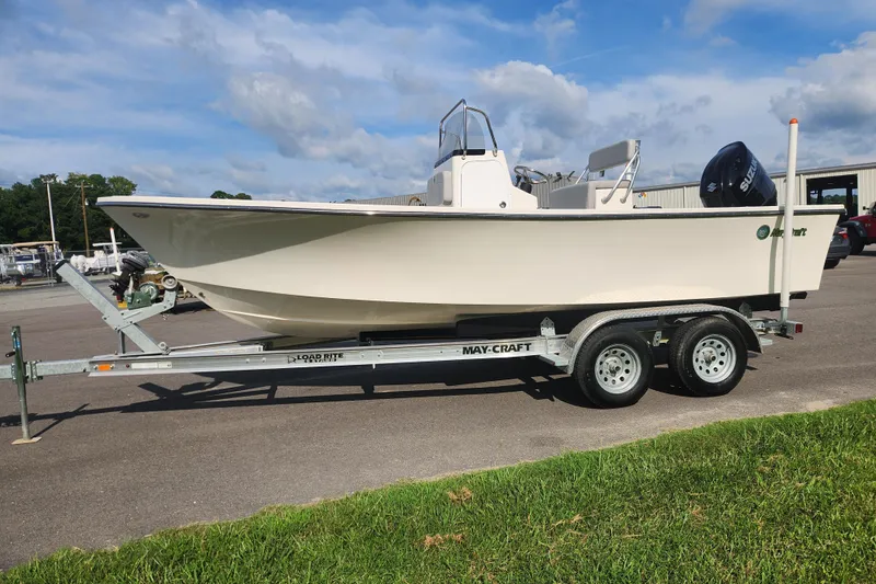 Slide: The Image of 2023 May-Craft 20 Cape Classic boat on trailer, parked outdoors. - 6