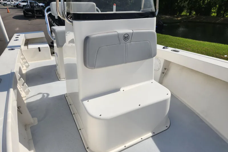 Slide: The Image of 2023 May-Craft 20 Cape Classic boat interior with seating and console. - 9