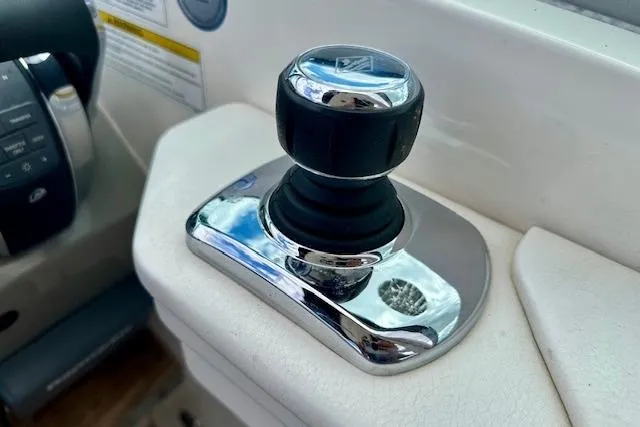 Slide: The Image of Joystick control on 2014 Sea Ray 350 Sundancer boat dashboard. - 12