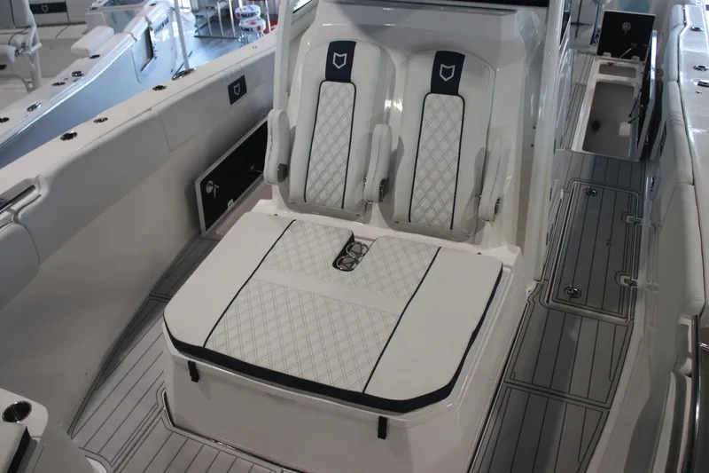 Slide: The Image of Luxurious seating area on 2026 Sea Fox 328 Commander boat, featuring elegant white upholstery. - 13