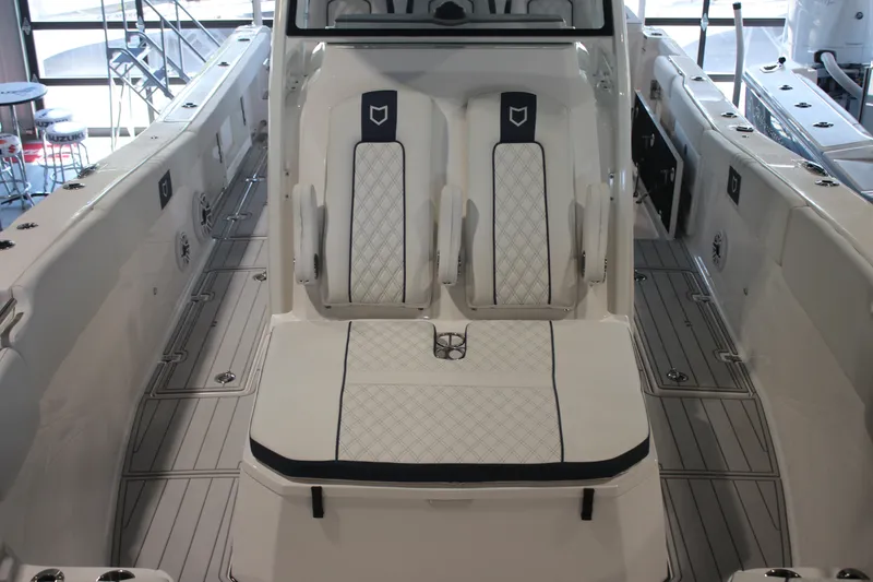 Slide: The Image of 2026 Sea Fox 328 Commander boat interior with modern helm and seating. - 16