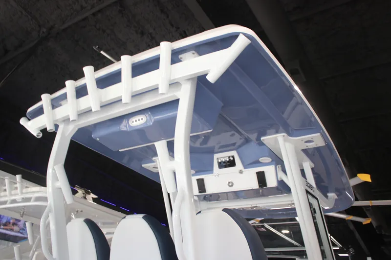 Slide: The Image of Electrical panel inside 2026 Sea Fox 328 Commander boat, featuring control switches and dials. - 19