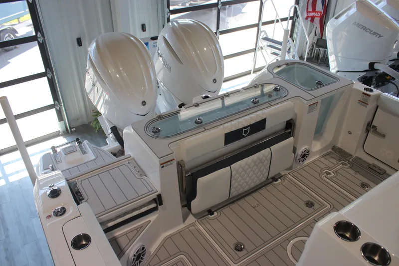 Slide: The Image of 2026 Sea Fox 328 Commander boat seat with elegant white and navy design. - 26