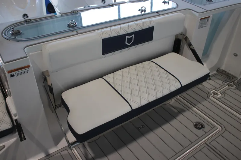 Slide: The Image of 2026 Sea Fox 328 Commander livewell with open lid, showcasing spacious interior. - 28
