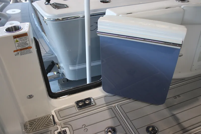 Slide: The Image of YETI cooler on 2026 Sea Fox 328 Commander boat deck, showcasing storage feature. - 32