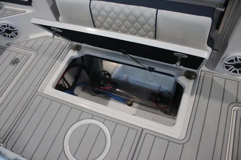 Slide: The Image of Luxurious seating area on 2026 Sea Fox 328 Commander boat with stylish upholstery and table. - 37