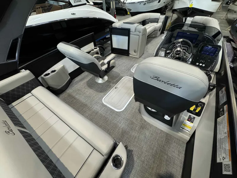 Slide: The Image of Interior of 2026 Barletta LUSSO 25UCAT with luxurious seating. - 18