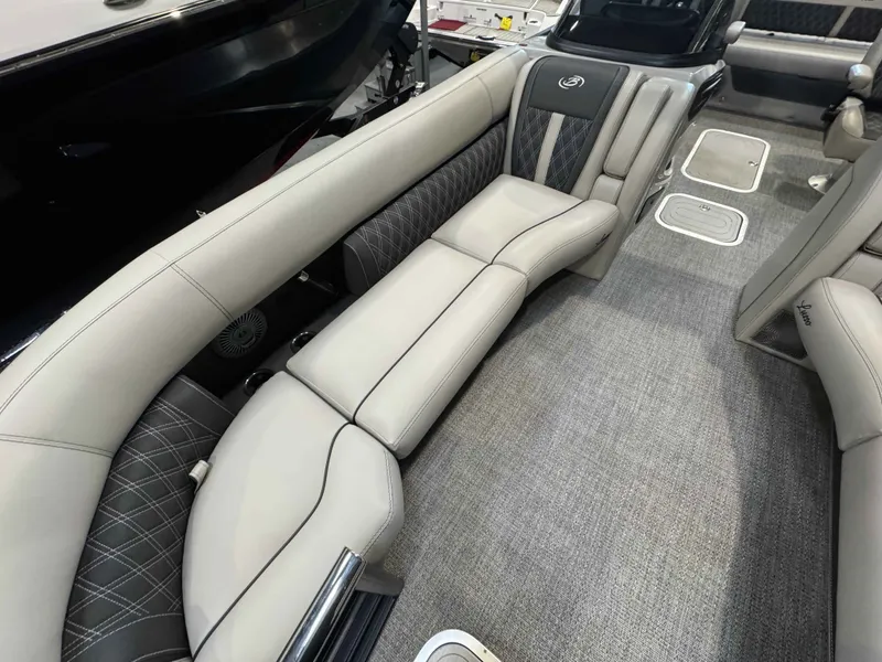 Slide: The Image of Interior of 2026 Barletta LUSSO 25UCAT with luxurious seating. - 25