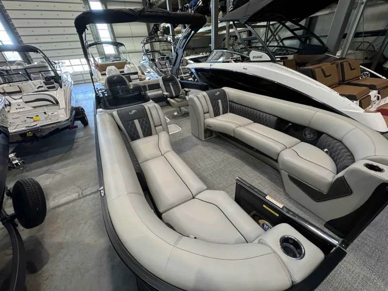 Slide: The Image of 2026 Barletta LUSSO 25UCAT pontoon boat in showroom. - 27