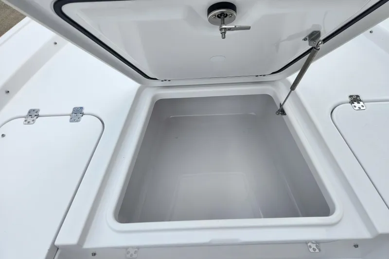 Slide: The Image of Open storage compartment on 2026 Sportsman Masters 227 Bay Boat. - 15