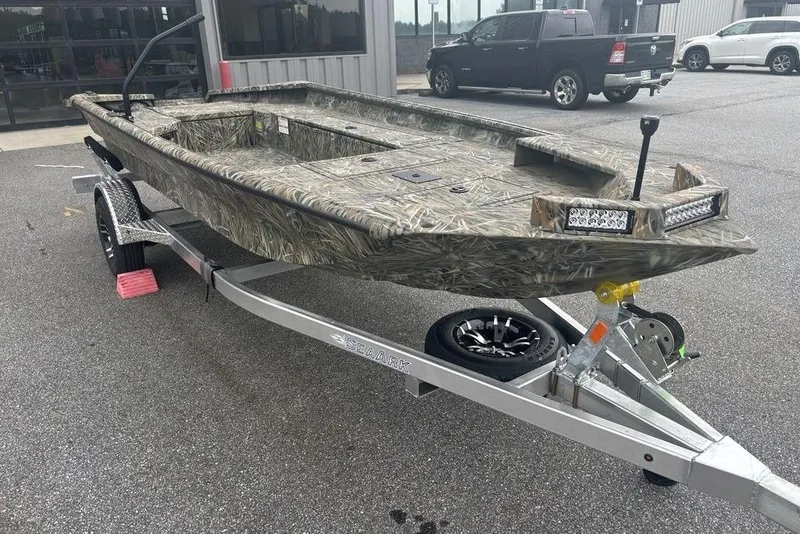 Slide: The Image of 2026 SeaArk 1752 Slayer X boat with camouflage interior design. - 10