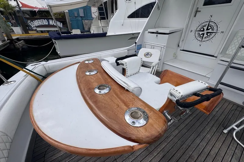 Slide: The Image of 1979 Hatteras 53 Motor Yacht fishing chair and deck at Sombrero Marina. - 20