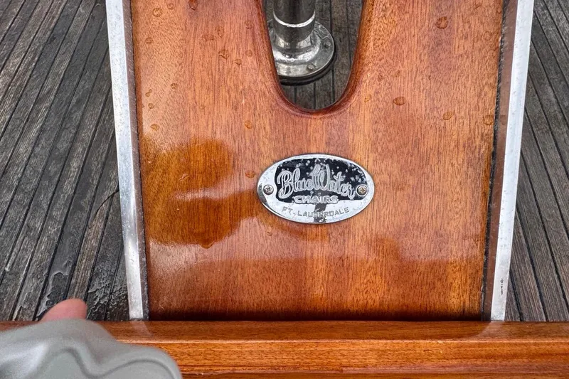 Slide: The Image of Wooden deck with Bluewater Chairs plaque on 1979 Hatteras 53 Motor Yacht. - 23