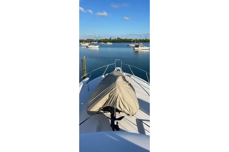 Slide: The Image of 1979 Hatteras 53 Motor Yacht with fishing chair and ladder on deck. - 5