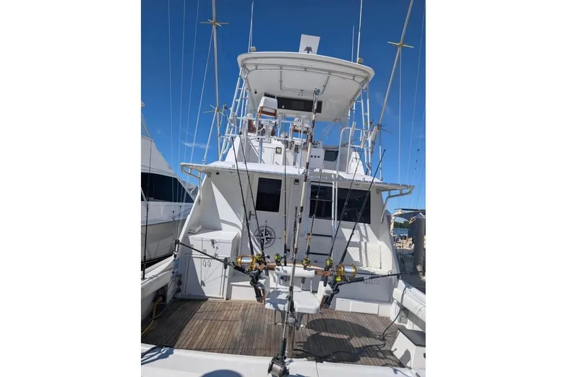 Slide: The Image of 1979 Hatteras 53 Motor Yacht with fishing chair and ladder on deck. - 6
