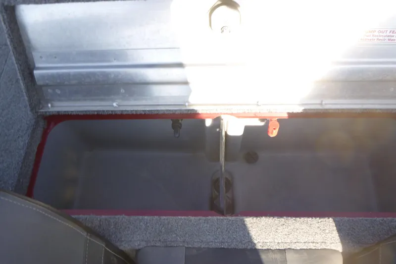 Slide: The Image of Open storage compartment in 2020 Tracker Pro Team 190 TX boat interior. - 15