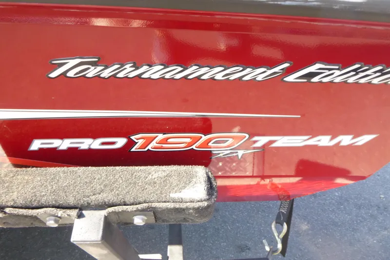 Slide: The Image of 2020 Tracker Pro Team 190 TX Tournament Edition boat, red exterior with logo. - 17