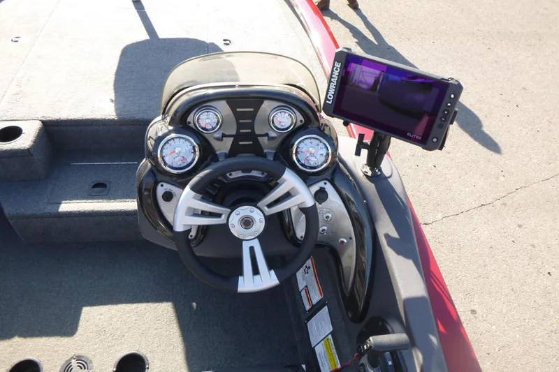 Slide: The Image of 2020 Tracker Pro Team 190 TX boat dashboard with steering wheel and Lowrance Elite 7 fishfinder. - 9