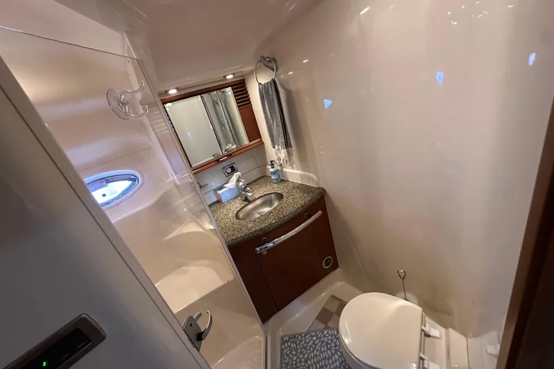 Slide: The Image of Luxurious bathroom in 2006 Sea Ray 52 Sundancer yacht with modern amenities. - 28